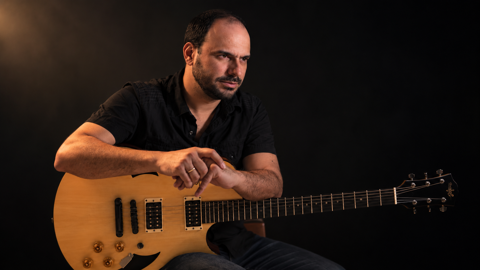 José Allende with his guitar